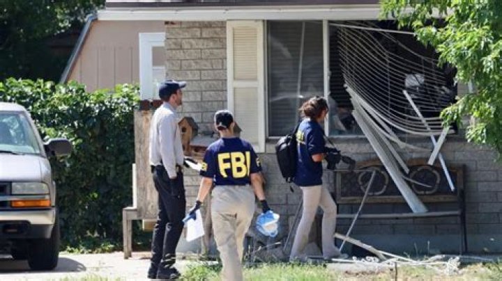 FBI Says Craig Robertson Pulled gun on Agents Before Being Shot