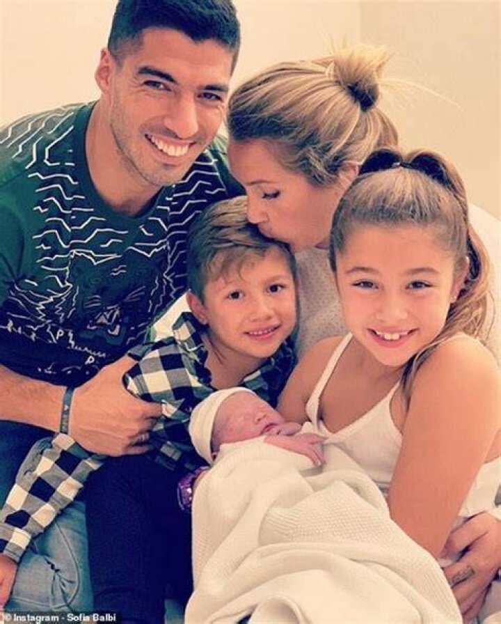 Luis Suarez shows off newborn son after starring in Champions League